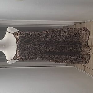 Cute leopard print summer dress, shear material on top of black underneath